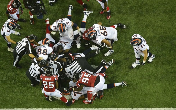Replacement officials fail to control the action in Denver on Monday, 9/17.