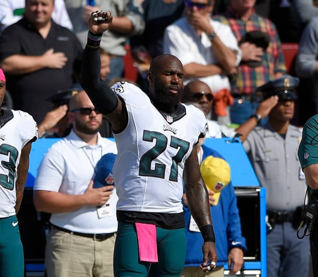 Malcolm Jenkins raises a fist during the national anthem. 