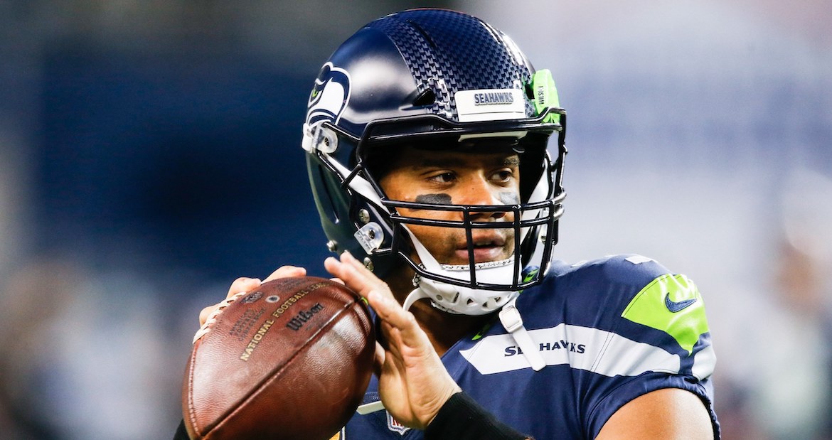 russell-wilson-announces-new-deal-with-seahawks-from-bed
